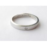 A Platinum Diamond Set Band Ring, finger size O. Gross weight 4.5 grams.