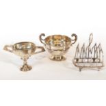 An Edward VII Silver Toast-Rack and Two Cups, The Toastrack by William Hutton and Sons, Sheffield,