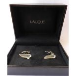 A Pair of Lalique Cufflinks, in the form of Victoire hood ornaments, boxed . The cufflinks are in