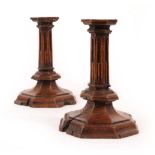 A Pair of Treen Candlesticks, in 17th century style, with octagonal drip pans, stop-fluted octagonal
