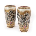 A Pair of Japanese Porcelain Baluster Vases, Meiji period, painted with warriors within formal