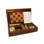 A Victorian Mahogany Cased Games Compendium, of rectangular form, containing two boards with playing