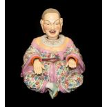 An Ernst Bohne & Sohne Porcelain Nodding-Head Pagoda Figure, circa 1900, modelled as a seated