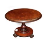 An Early 20th Century Mahogany Cake Stand, in the form of a Victorian tilt-top table, 29cm diameter