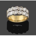 A Diamond Ring, the twelve marquise cut diamonds arranged in two rows in white claw and collet