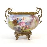 A French Gilt Metal Mounted Porcelain Jardinière, late 19th century, of ovoid form with leaf cast