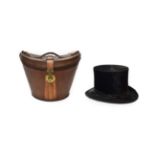 A Dunn & Co Silk Top Hat, 20th century, in a stitched leather fitted case . approx. 56cm/22''
