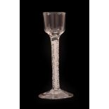 A Cordial Glass, circa 1750, the ogee bowl on a double series opaque twist stem and circular foot,
