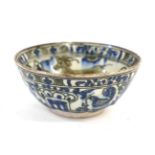 A Persian Faience Bowl, possibly 16th century, painted in underglaze blue and brown with figures and