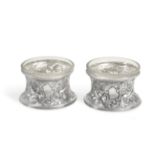 A Pair of Victorian Silver Salt-Cellars, by Nathan and Hayes, Chester, 1898, each in the form of