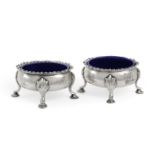 A Pair of George III Silver Salt-Cellars, by David and Robert Hennell, London, 1766, each bombé oval