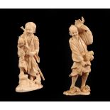 A Japanese Ivory Okimono as a Woodsman, Meiji period, carrying a staff and two toads, a further toad