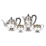 A Three-Piece George V Silver Tea-Service and a Hot-Water Jug En Suite, The Tea-Service by S