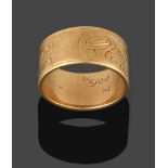 A Canadian Band Ring, the yellow band engraved with an abstract pattern, finger size Q see