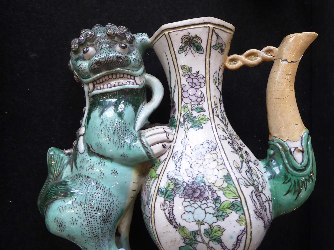 A Pair of Chinese Bisque Ewers and A Cover, in Kangxi style, of baluster form with dog of fo handles - Image 2 of 16