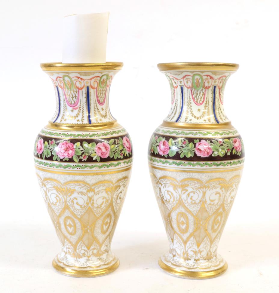 A Pair of Paris La Courtille Porcelain Vases, circa 1800, of baluster form with trumpet necks,