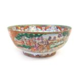 A Chinese Porcelain ''Hunting Subject'' Punch Bowl, Qianlong, painted in famille rose enamels with