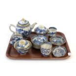 A Chinese Porcelain Composite Tea Service, Qianlong, of fluted form, painted in underglaze blue with