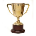 A George V Silver Trophy-Cup, by Adie Brothers, Birmingham, 1932, facetted tapering and on spreading