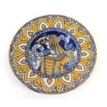A Maiolica Bella Donna Dish, in 16th century Deruta style, painted in blue and ochre with a bust