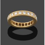 An 18 Carat Gold Diamond Eternity Ring, twenty-one round brilliant cut diamonds in yellow claw and