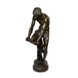 Chombard Le Boucheron de la Fontain: A Bronze Figure of a Youth, breaking a bundle of sticks on