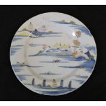 An English Delft Plate, mid 18th century, painted in blue, yellow and manganese with a river
