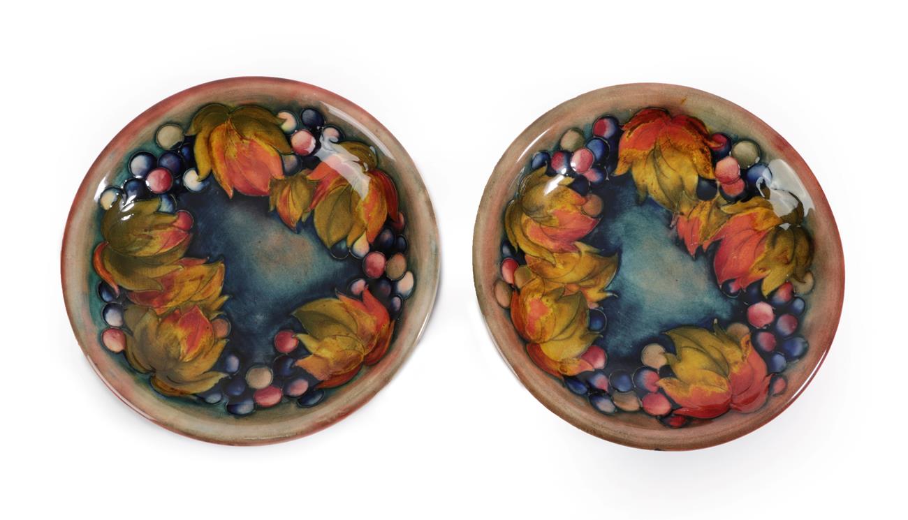 William Moorcroft (1872-1945): A Flambé Leaf and Grape Pattern Dishes, impressed facsimile signature