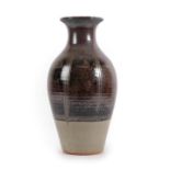 Eddie (Edward Leslie) Hopkins (b.1941): A Stoneware Vase, tenmoku glaze with combed decoration,