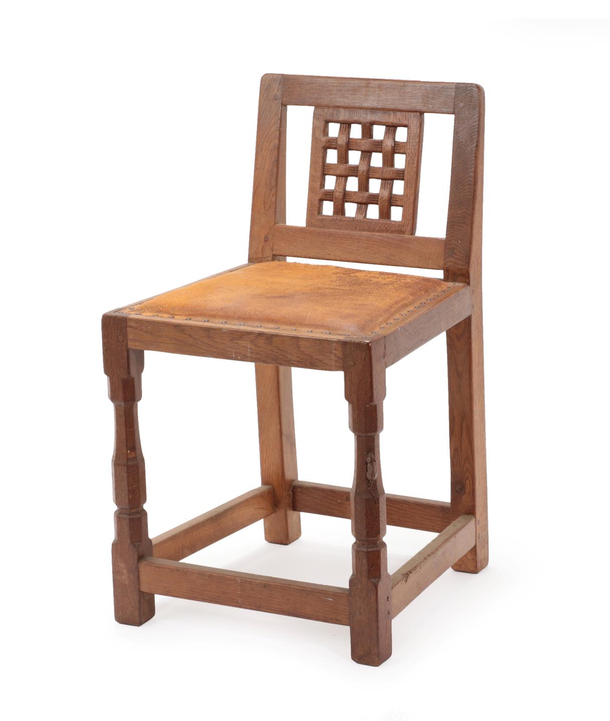 Robert Mouseman Thompson (1876-1955): An English Oak Low Lattice Back Chair, 1940's/50's, with