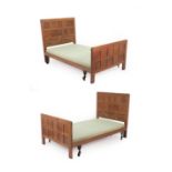 Robert Mouseman Thompson (1876-1955): A Pair of English Oak 3' 6'' Bedsteads, 1930's, each with half