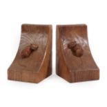 Workshop of Robert Mouseman Thompson (Kilburn): A Pair of English Oak Single Mouse Bookends, each