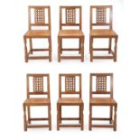 A Set of Six Sid Pollard of Thirsk English Oak Lattice Back Dining Chairs, with nailed tan hide