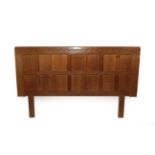 Workshop of Robert Mouseman Thompson (Kilburn): An English Oak 4ft 6'' Panelled Divan Headboard,