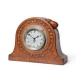 Robert Mouseman Thompson (1876-1955): An English Oak Mantel Clock, 1930's, the circular case with