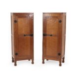 Robert Mouseman Thompson (1876-1955): A Pair of English Oak Tall Panelled Cupboards, 1940's/50's,
