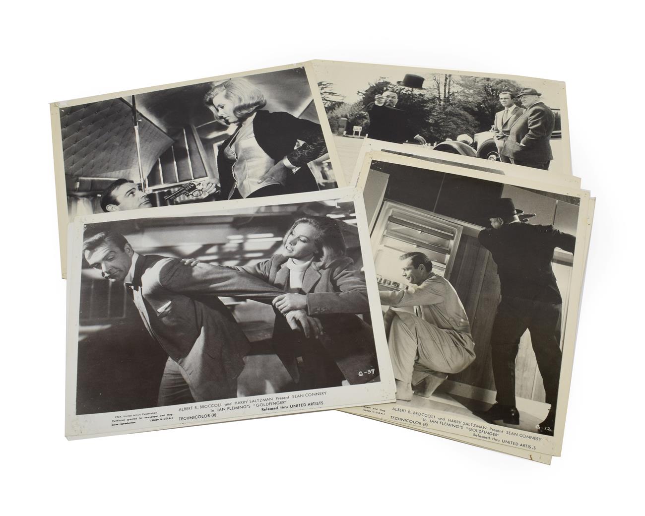 James Bond 007 Goldfinger Black And White Lobby Cards a collection of 24 each embossed with stamp '