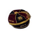 Rugby Cap maroon/black with lion and wheat sheaf badge, embroidered '1913-14' to brim and '1919-20',