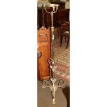 An Art Nouveau brass oil lamp stand