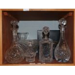 A selection of glass, including decanters, glass bowl, flared vase and a Stuart crystal bowl a metal