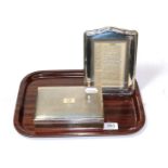 Silver cigarette box and a silver mounted photograph frame