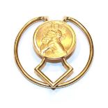 A 9 carat gold money clip . Gross weight 15.9 grams.