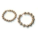Two silver bead bracelets, lengths 19cm and 21cm, both stamped 'Tiffany & Co.'