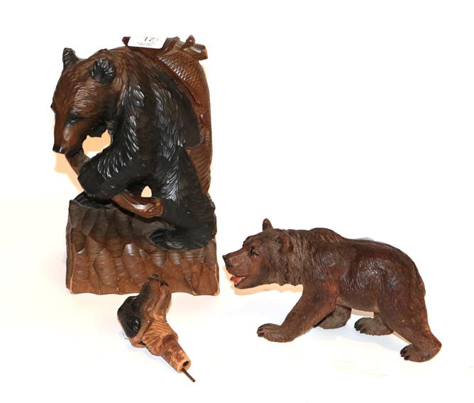 Two Black Forest type carved bears and a carved decanting dogs head (3)