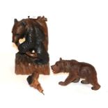 Two Black Forest type carved bears and a carved decanting dogs head (3)