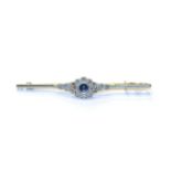 A sapphire and diamond bar brooch, stamped '18CT & PLAT', length 5.4cm . Gross weight 3.7 grams.