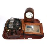 A tray including am inlaid mantel timepiece, blotter, papier mache inkwell, etc