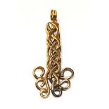 An 18 carat two-colour gold pendant, length 4.4cm. Gross weight 6.9 grams.