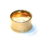 A band ring, by Tiffany, stamped '750', length J. Gross weight 10.7 grams.