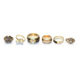 A 9 carat gold band ring, finger size K1/2; a 9 carat gold Scottish thistle ring, finger size G1/